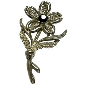 Vintage Sarah Coventry "Black Beauty" silver-tone flower brooch late 1960s.